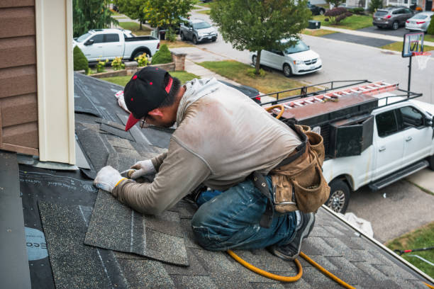 Professional Roofing technician working in Hurley, SD